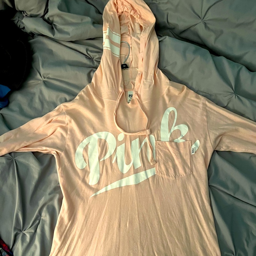 Victoria Secret Pink sweatshirt. Color is pink and it’s and extra small.
